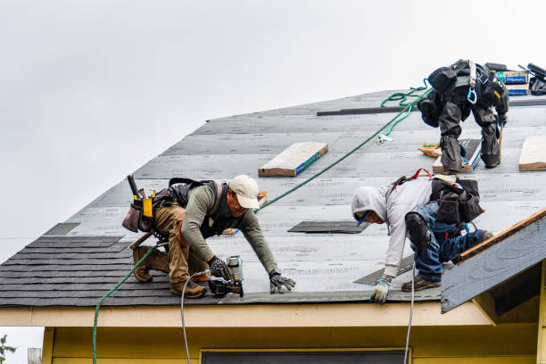 Professional Gutter Installation technician working in Salem, IN